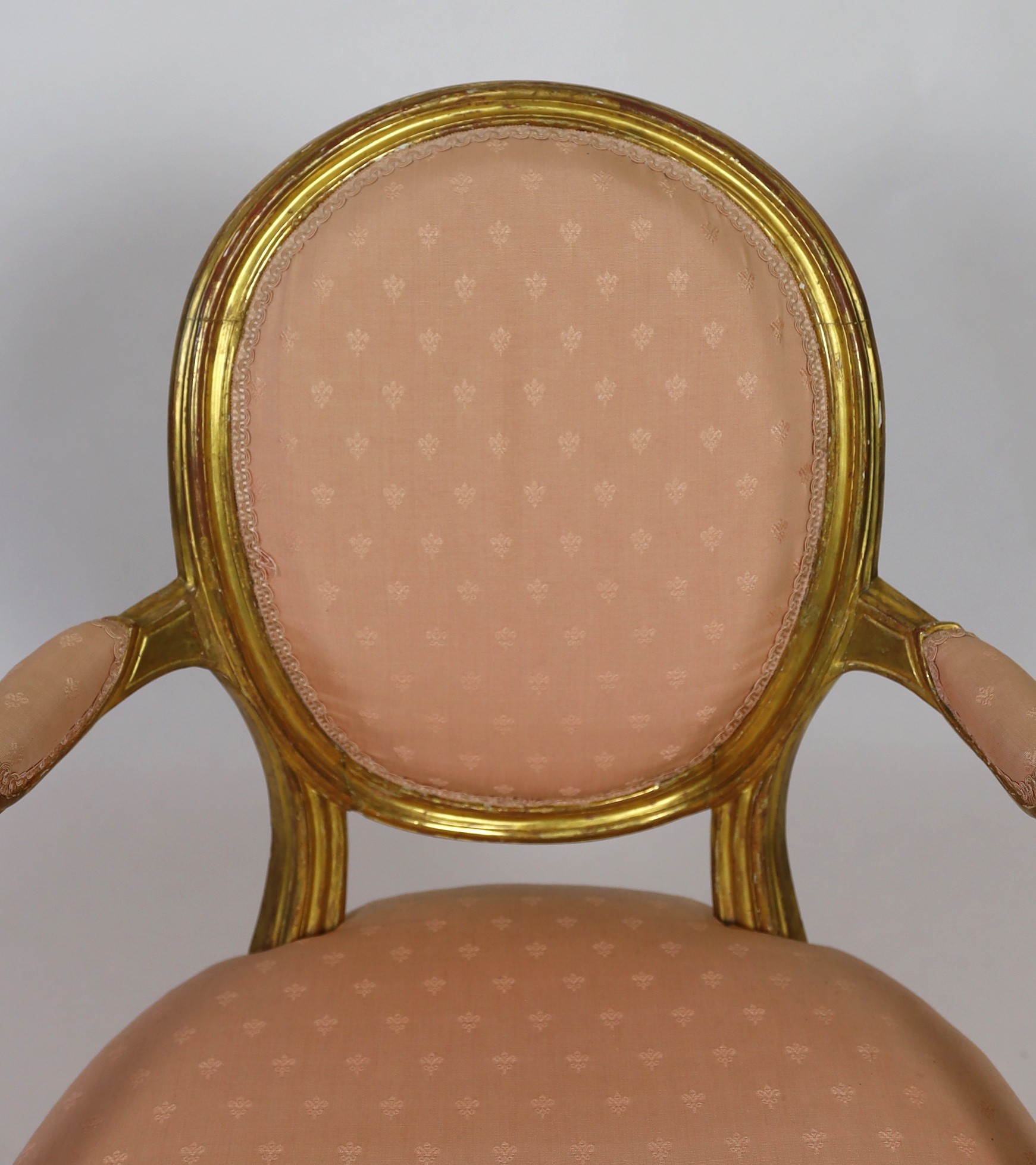 A George III Adam style giltwood armchair, width 61cm height 93cm